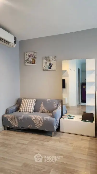 Cozy living room with modern decor and stylish furniture in a contemporary apartment.
