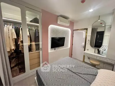 Modern bedroom with built-in wardrobe and stylish vanity area