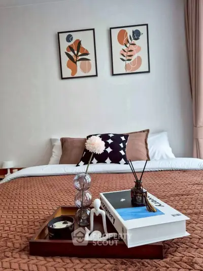 Stylish bedroom with modern decor and cozy bedding