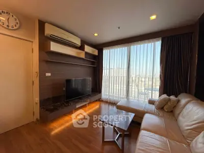 Modern living room with large windows and stylish furniture