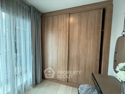 Modern bedroom with wooden wardrobe and elegant decor