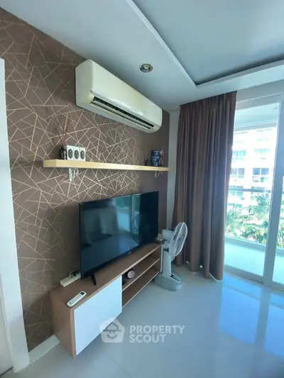 Modern living room with air conditioning and balcony view
