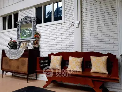 Charming vintage living room with brick wall and elegant decor