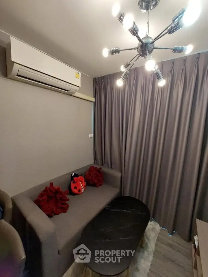 Cozy living room with modern lighting and stylish decor