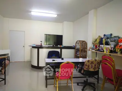 Spacious office room with modern decor and ample seating