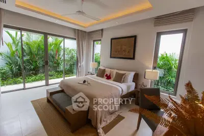 Luxurious bedroom with garden view and modern decor, perfect for relaxation.