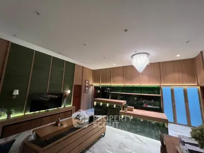 Luxurious modern living room with elegant chandelier and stylish decor