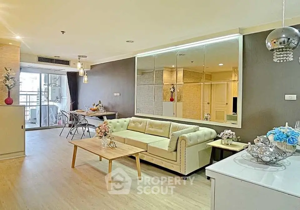 Spacious modern living room with elegant decor and open layout in a stylish apartment.