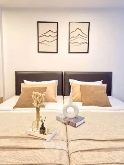 Elegant bedroom with stylish decor and cozy bedding, perfect for relaxation and comfort.