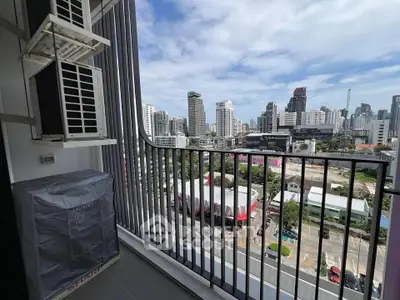 Stunning city view from modern balcony with sleek railing design