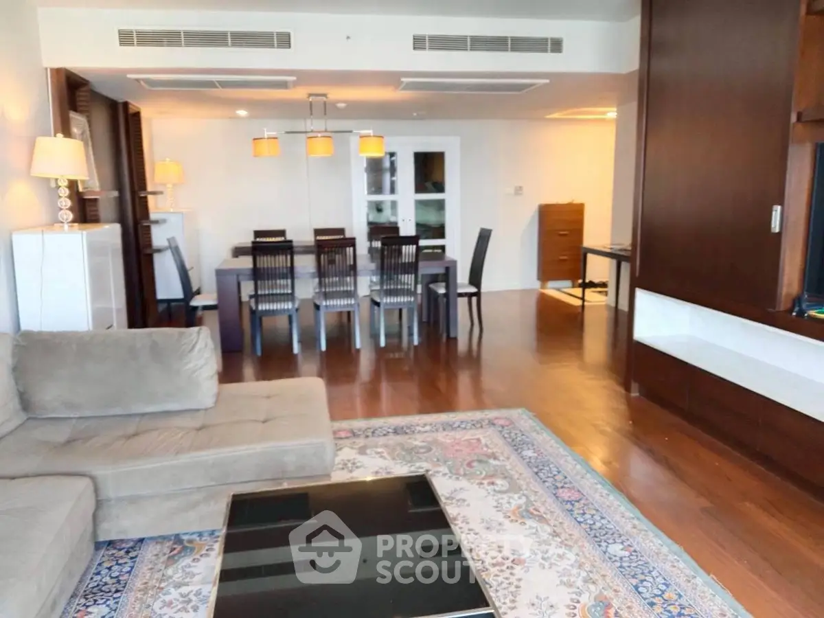 Spacious living room with elegant dining area and modern decor