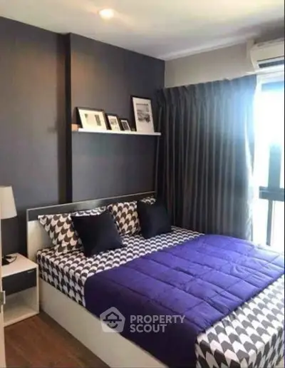Modern bedroom with stylish decor and natural light