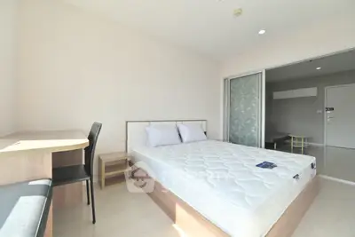 Bright and airy bedroom with modern furnishings and ample natural light