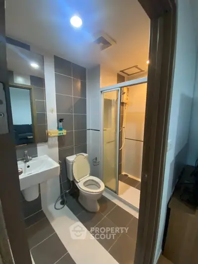 Modern bathroom with sleek design and glass shower enclosure