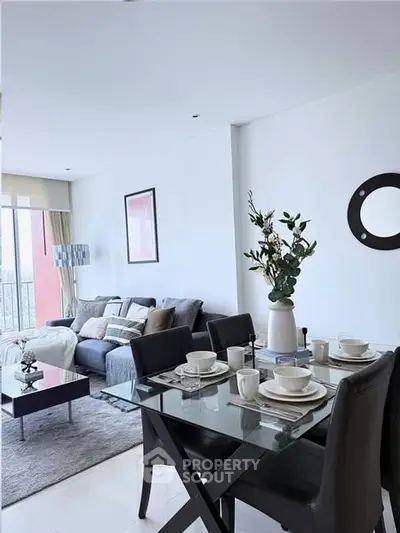 Modern living room with elegant dining area and stylish decor
