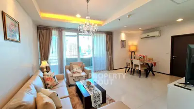 Spacious living room with elegant decor and city view