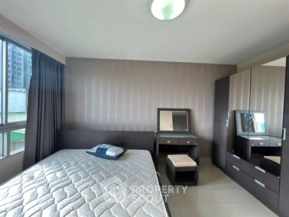 Modern bedroom with sleek furniture and stylish decor