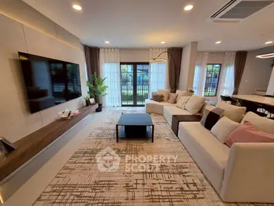 Spacious modern living room with large sofa and stylish decor