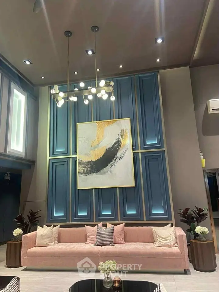 Luxurious living room with modern art and elegant lighting