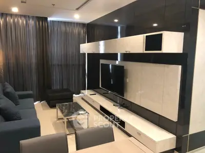 Modern living room with sleek entertainment center and large TV