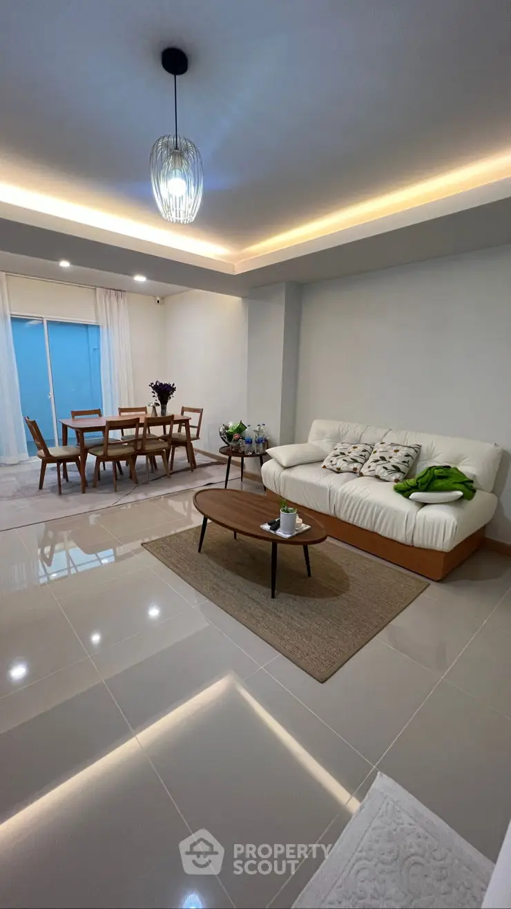 Modern living room with stylish decor and cozy seating area