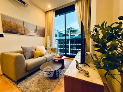 Chic modern living room with cozy sofa, stylish decor, and balcony view in urban apartment.