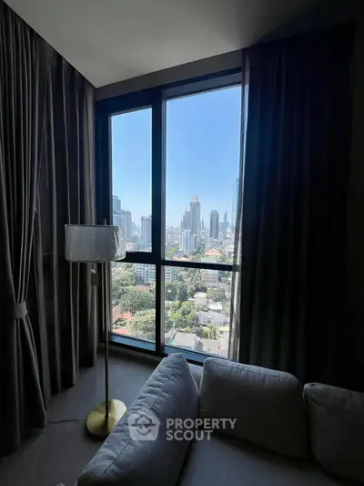 Modern living room with stunning city view through large windows