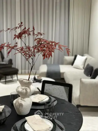 Elegant living room with modern decor and cozy seating area