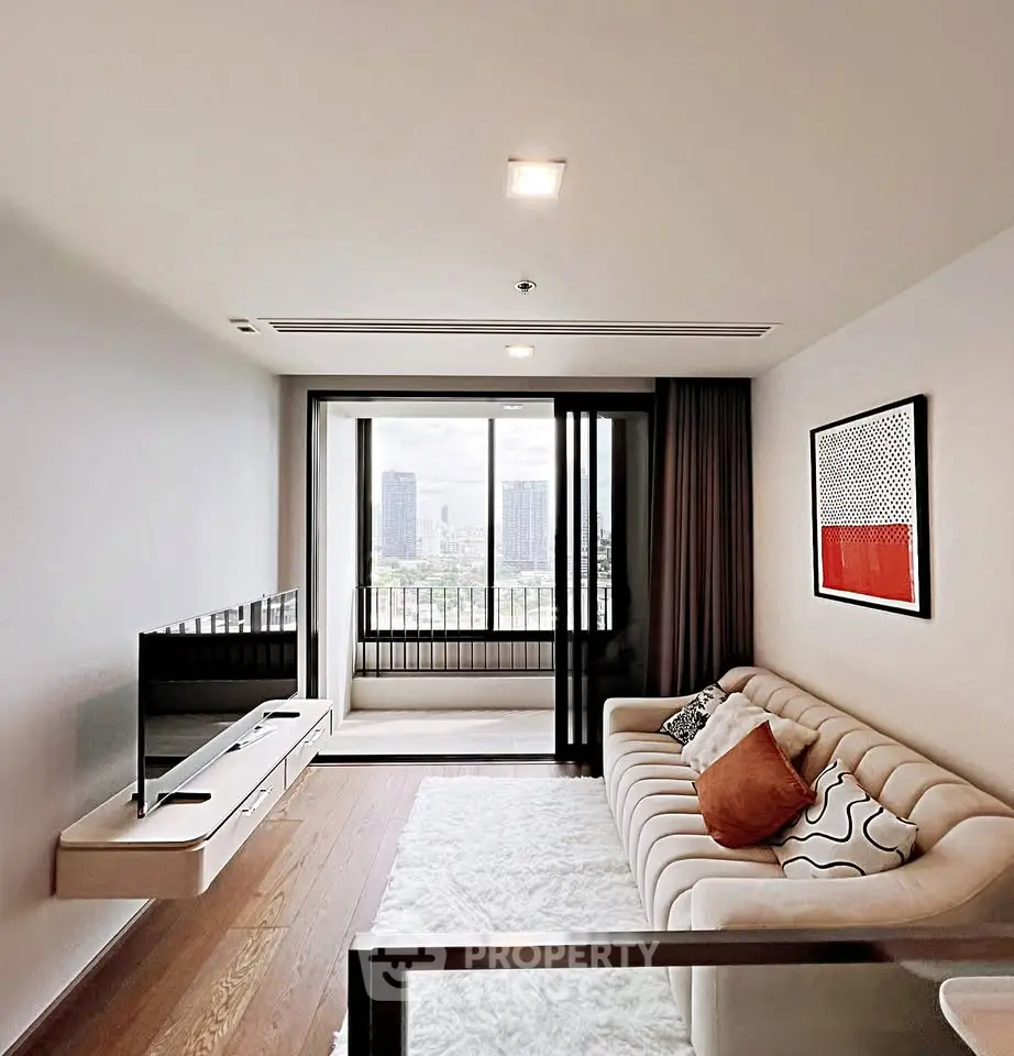 Modern living room with sleek design, large window offering city view, and stylish decor.