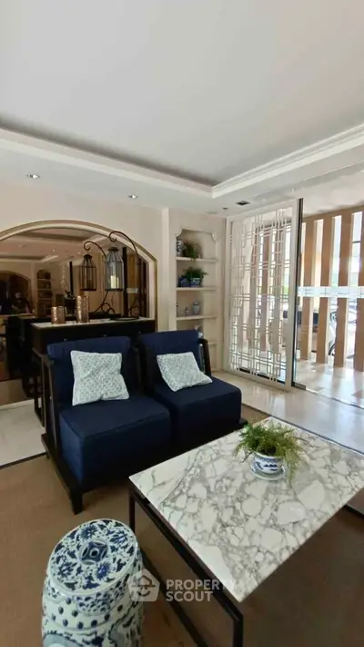 Luxurious living room with elegant decor and marble coffee table