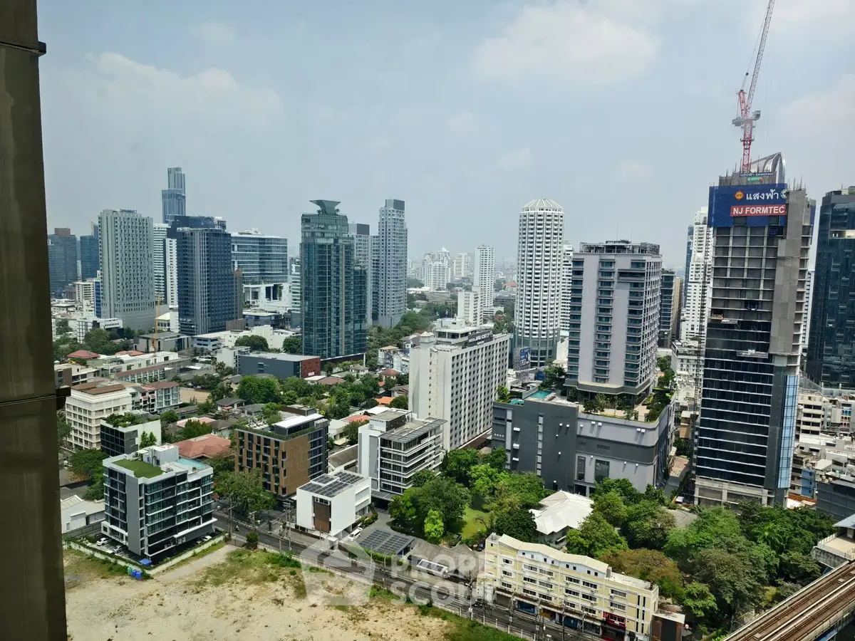 Stunning cityscape view showcasing modern high-rise buildings and urban skyline.