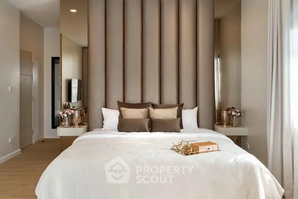 Luxurious bedroom with elegant decor and plush bedding