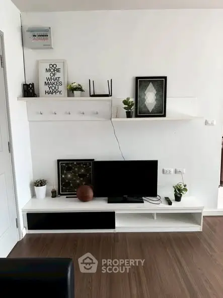 Modern living room with sleek TV unit and stylish decor