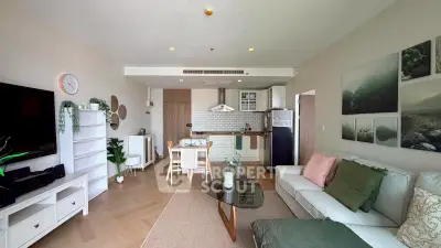 Modern open-plan living room with stylish kitchen and cozy seating area