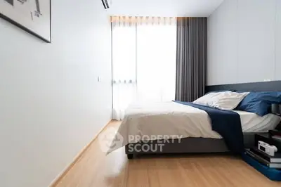 Modern bedroom with sleek design and natural light