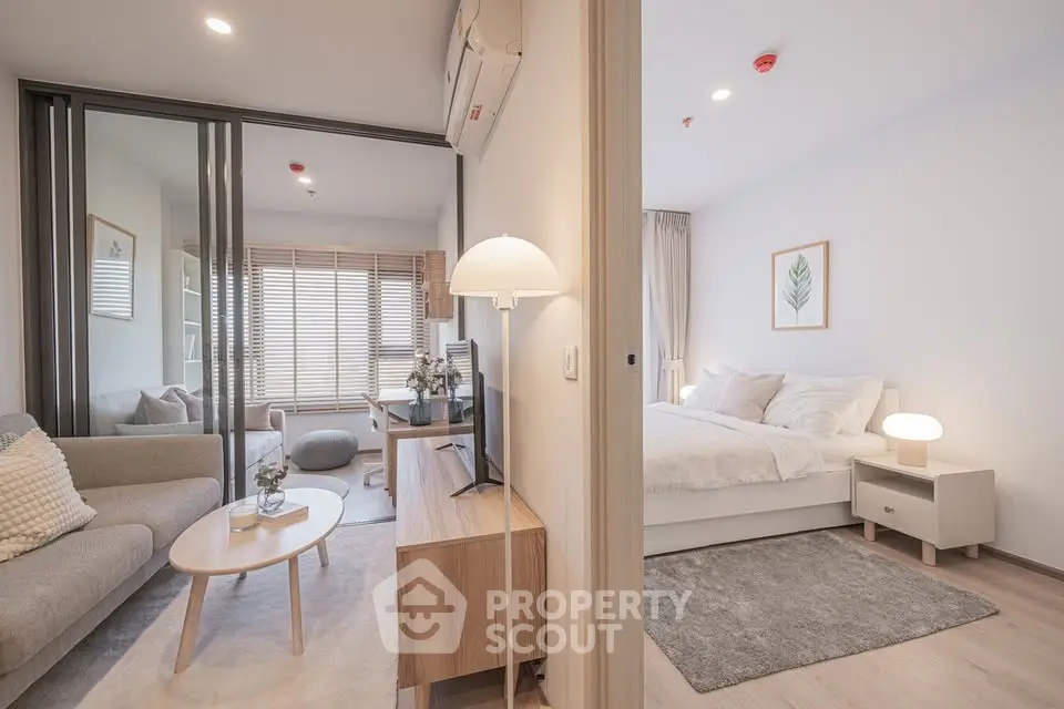 Modern apartment interior with cozy living room and elegant bedroom, featuring stylish furniture and soft lighting.