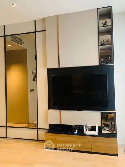 Modern living room with sleek TV unit and stylish decor