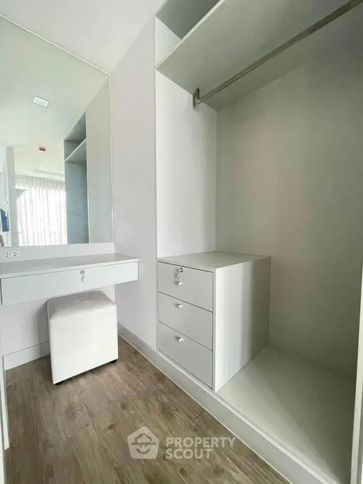 Spacious walk-in closet with modern design and ample storage space