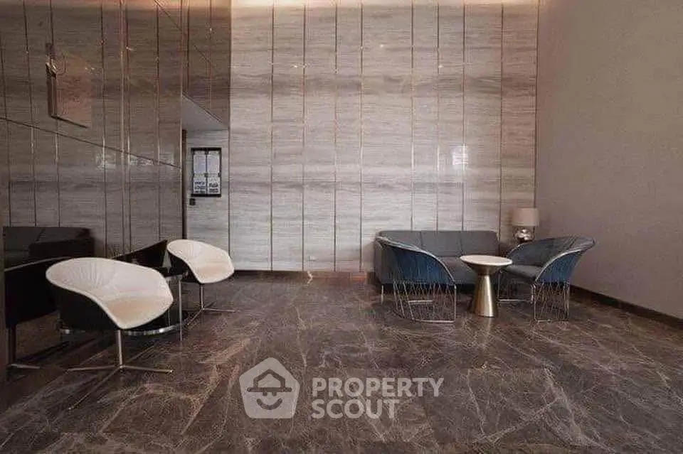 Luxurious modern lobby with elegant seating and marble flooring