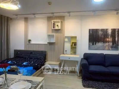 Modern studio apartment with stylish decor and cozy furnishings