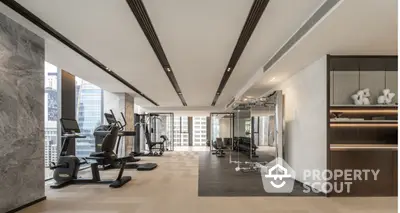 Luxurious high-rise gym with modern equipment and city views