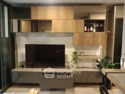 Modern living room with sleek TV unit and stylish shelving, perfect for contemporary home decor.