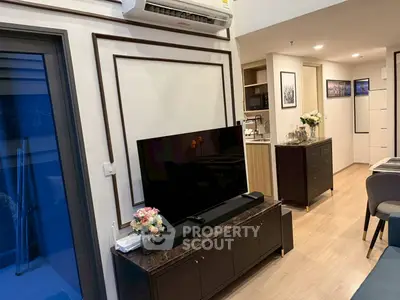 Modern living room with sleek TV setup and elegant decor
