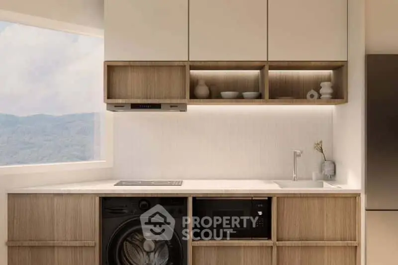 Modern kitchen with sleek cabinetry, built-in appliances, and scenic window view.