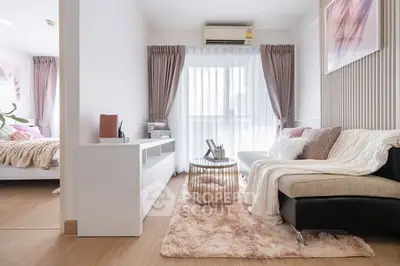 Modern living room with cozy decor and natural light