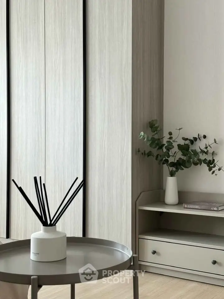 Modern minimalist interior with sleek furniture and elegant decor in a stylish living space.