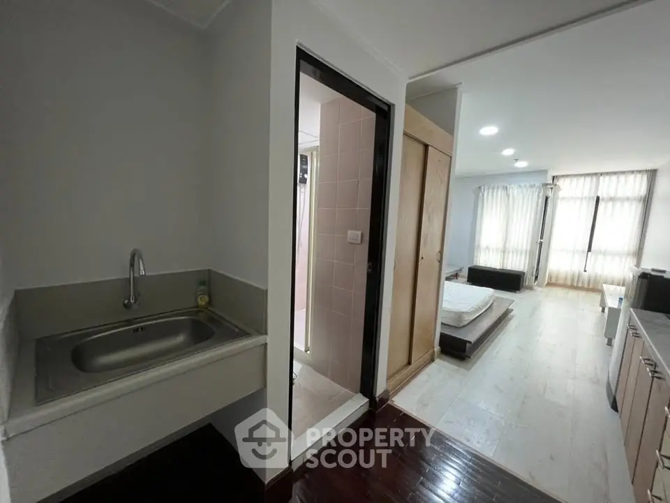 Modern studio apartment with open layout and natural light
