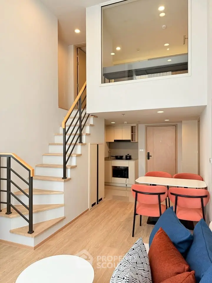 Modern duplex apartment with stylish open layout and cozy living area