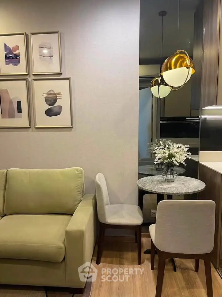 Stylish living room with modern decor and cozy seating area, perfect for relaxation and entertaining.