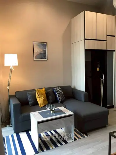 Modern living room with stylish sofa and chic decor